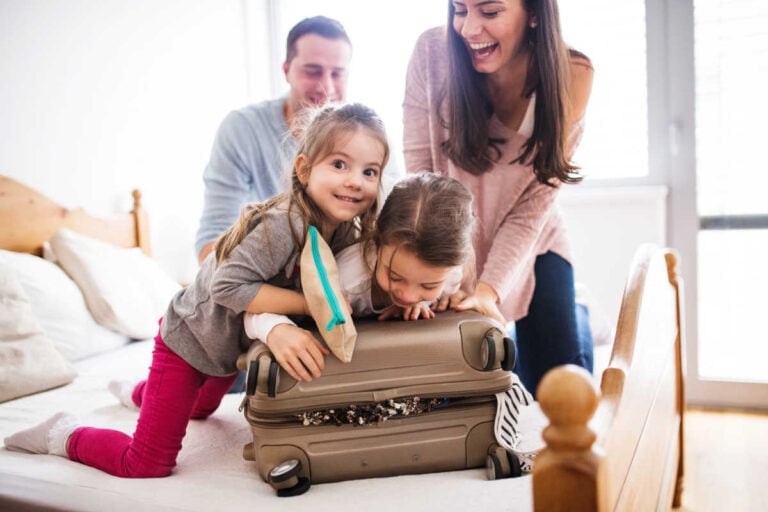 Family packing suitcase