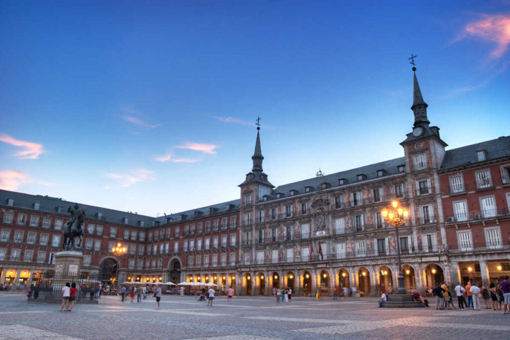 Plaza Mayor Spain with couples nightfall
